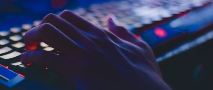 photo of person typing on computer keyboard